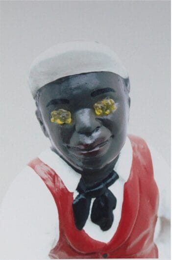 Sculpture of a figure with yellow eyes and red vest, available at Chelsea Art Group - New York City top trusted art advisers in conceptual art.
